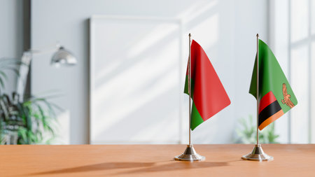 FLAGS OF  BELARUS AND ZAMBIA  ON TABLEの写真素材