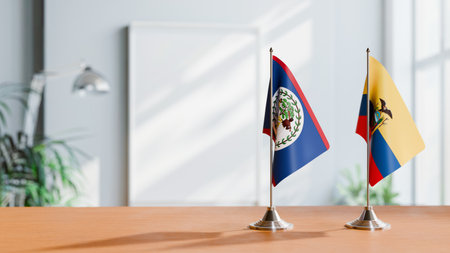 FLAGS OF BELIZE AND ECUADOR ON TABLEの写真素材