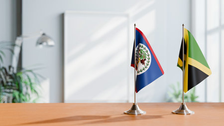 FLAGS OF BELIZE AND JAMAICA ON TABLEの写真素材