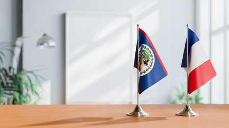 FLAGS OF BELIZE AND FRANCE ON TABLEの写真素材