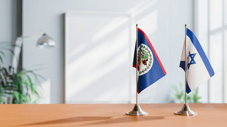 FLAGS OF BELIZE AND ISRAEL ON TABLEの写真素材
