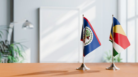 FLAGS OF BELIZE AND SEYCHELLES ON TABLEの写真素材