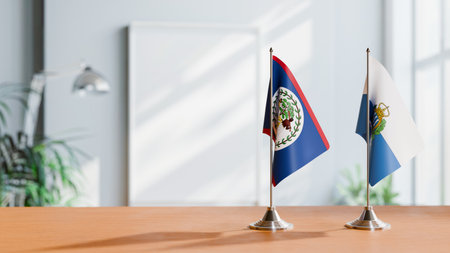 FLAGS OF BELIZE AND SAN MARINO ON TABLEの写真素材