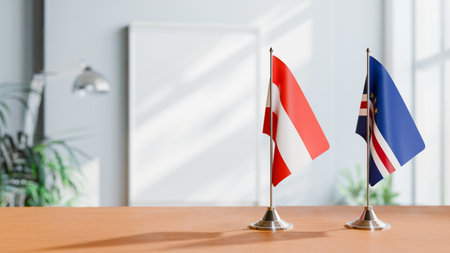 FLAGS OF  AUSTRIA AND CAPE VERDE  ON TABLEの写真素材