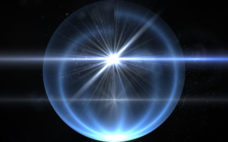 abstract sun burst with digital lens flare light over black background.Abstract image of sun burst...
