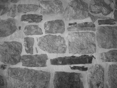 Stone Wall Castle Closeup. It is stone rough wall for pattern and background. Old gray stone wall background textureの写真素材