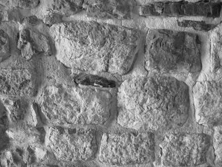 Stone Wall Castle Closeup. It is stone rough wall for pattern and background. Old gray stone wall background textureの写真素材