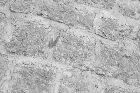 Stone Wall Castle Closeup. It is stone rough wall for pattern and backgroundの写真素材