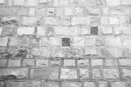 Stone Wall Castle Closeup. It is stone rough wall for pattern and backgroundの写真素材