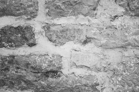 Stone Wall Castle Closeup. It is stone rough wall for pattern and backgroundの写真素材