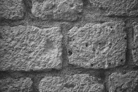 Stone Wall Castle Closeup. It is stone rough wall for pattern and backgroundの写真素材