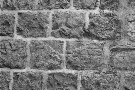 Stone Wall Castle Closeup. It is stone rough wall for pattern and backgroundの写真素材