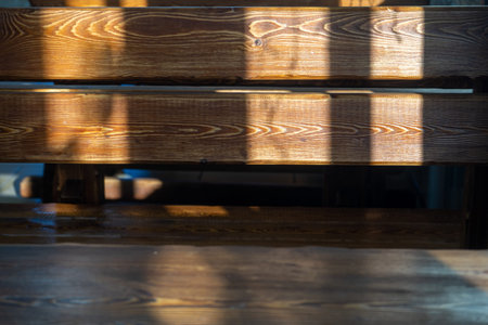The rays of the sun on the wooden texture.の写真素材
