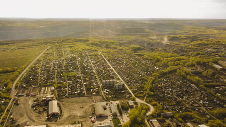 Aerial view of a small town in the middle of the fieldの写真素材