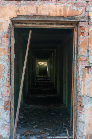 Abandoned corridor in an old abandoned house. Abandoned buildingの写真素材