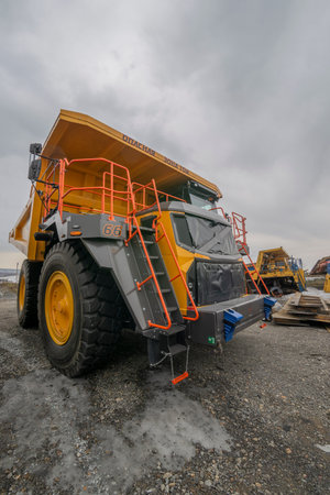 Dump truck at the construction site of a new multi-storey building