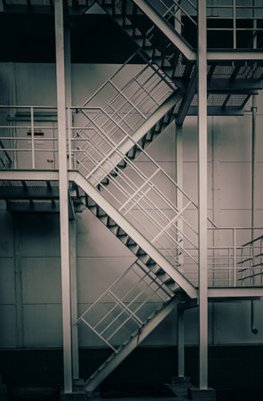 Staircase in old factory building, retro toned image.の写真素材