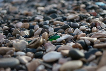 Background sea pebbles a lot of wet rocksの写真素材