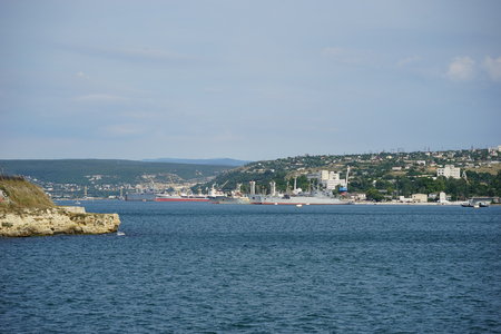 The city of Sevastopol from the sea with a variety of buildings and shipsの写真素材