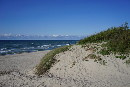 Deserted seascape on the Baltic sea and sand dunesの写真素材