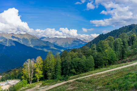 Mountain landscape against cloudy blue sky in Krasnaya Polyana Sochiの写真素材