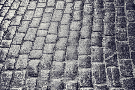 Black-and-white background in the form of abstraction with a stylized pavementの写真素材