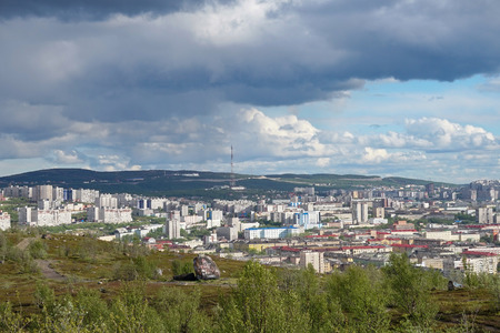 Murmansk, Russia-June 5, 2015: The urban landscape of the Murmansk Soviet architecture and the bright foliage of summer.のeditorial素材