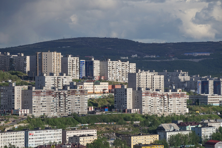 Murmansk, Russia-June 5, 2015: The urban landscape of the Murmansk Soviet architecture and the bright foliage of summer.のeditorial素材