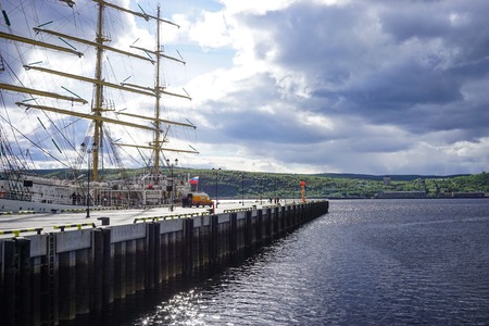 Murmansk, Russia-June 5, 2015: Sea port in the Arctic town with moored old sailing ship.のeditorial素材