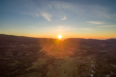 landscape with heights with mountain views and vivid sunse