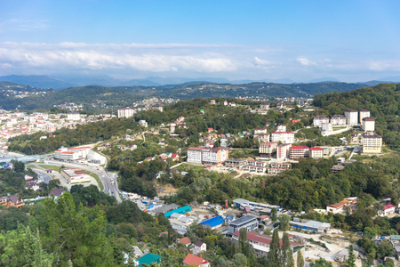 Sochi, Russia-October 7, 2016: The urban landscape of a tropical resort city in the autumn time of year.のeditorial素材