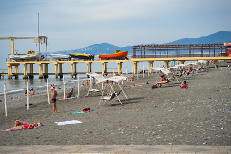 Sochi, Russia-October 11, 2016: Small town beach in the autumn of the year at the resort.のeditorial素材