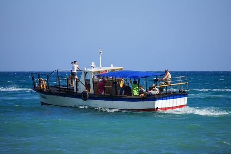 Koktebel, Crimea-June 27, 2015: Boat trip on the blue sea on a warm summer day.のeditorial素材