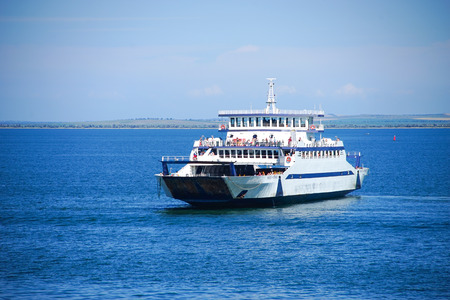Kerch, Crimea-June 17, 2016: Sea trucking ferry on blue sea backgroundのeditorial素材