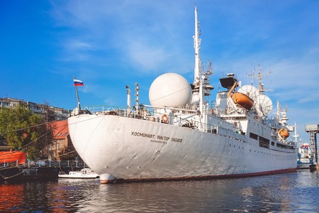 Kaliningrad , Russia-may 11, 2016: Port of a large Russian city with ships and various equipment on the background of the river.のeditorial素材