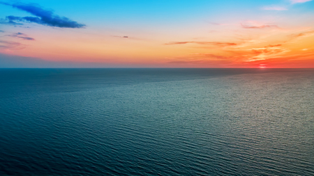 natural scenery delicious delicate sunset over a calm seaの写真素材