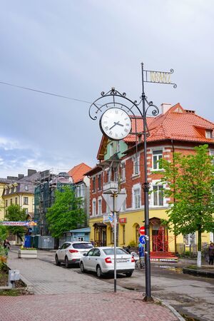 Zelenogradsk, Russia-may 17, 2016: Urban landscape with beautiful street clock on a Sunny spring day.のeditorial素材