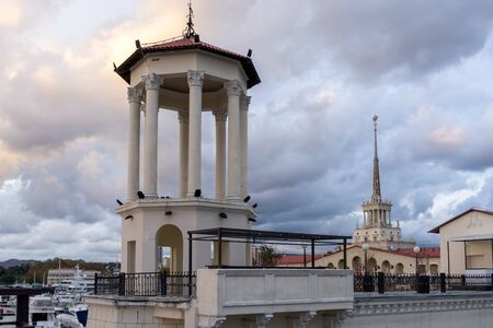 Sochi, Russia-October 30, 2017: Elegant stone rotunda on the background of the seaport.のeditorial素材