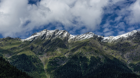 The magnificent mountain scenery on the background of emerald lake Ritsa in Abkhaziaの写真素材