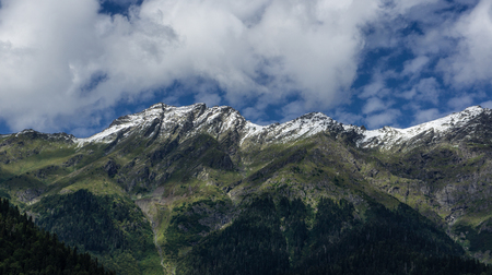 The magnificent mountain scenery on the background of emerald lake Ritsa in Abkhaziaの写真素材