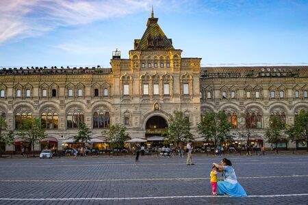 urban landscape with a view of the Department store and the area in which sit a woman and a little girl. Moscow, Russia. June 2, 2015.のeditorial素材