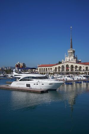 Sochi, Russia-April 25, 2015: Beautiful yacht on the background of the sights of the resort city at the seaport.のeditorial素材