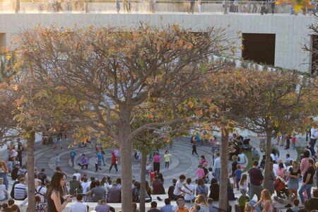 Krasnodar. Russia. Park Galitsky. 08 2017. People at the opening of a modern leisure Park before sunset.のeditorial素材
