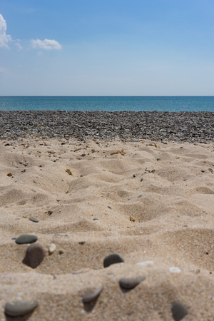 Vertical photo of the sea landscape with a beach of sand and .の写真素材
