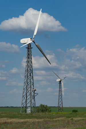 Evpatoria, Crimea-may 25, 2018: Panorama of wind farms against the blue sky with clouds.の写真素材