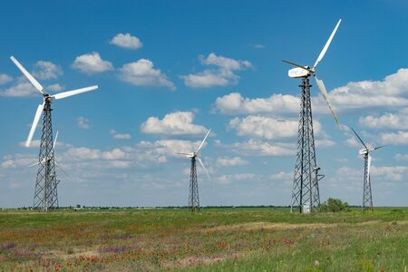 Evpatoria, Crimea-may 25, 2018: Panorama of wind farms against the blue sky with clouds.のeditorial素材