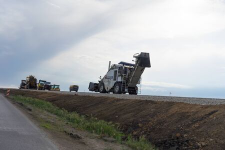 Tavrida, Crimea-may 19, 2018: Construction equipment on the construction of the highway Tavrida in the Crimea.のeditorial素材