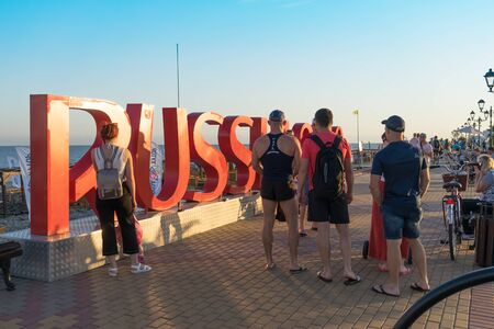 Sochi, Russia-June 9, 2018: People are photographed at the big red inscription.のeditorial素材