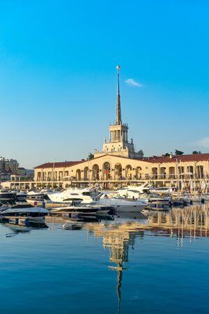 Sochi, Russia-June 14, 2018: The building of the seaport with reflection in the water surface of the sea.のeditorial素材