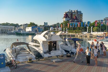 Sochi, Russia-June 14, 2018: foreign tourists in the seaport waiting for a walk on the sea.のeditorial素材